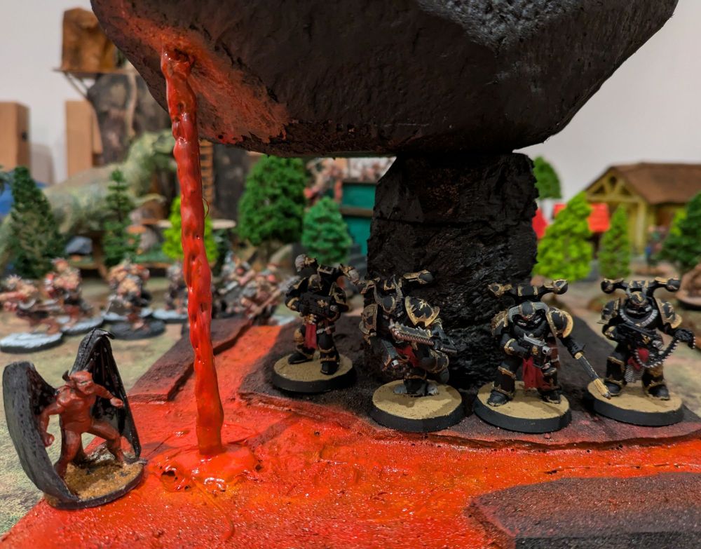 Zoom at the daemon and 4 legionaries near the lava
