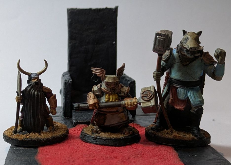 Two fantasy dwarves warriors standing beside a boarman, all armed.
